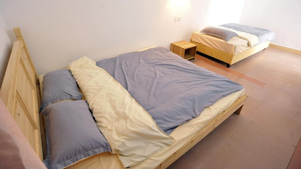 Lan Shan Chu Youth Hostel Yangshuo Zimmer foto